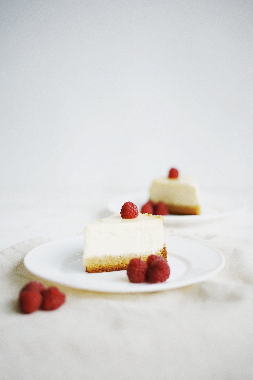 slice of cake with raspberry topping